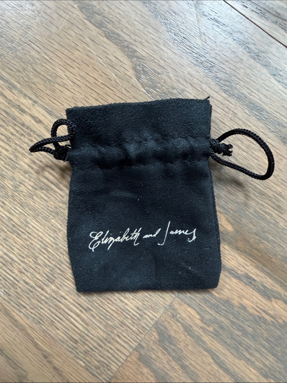 Elizabeth and James Black Velvet Drawstring Pouch with White Logo